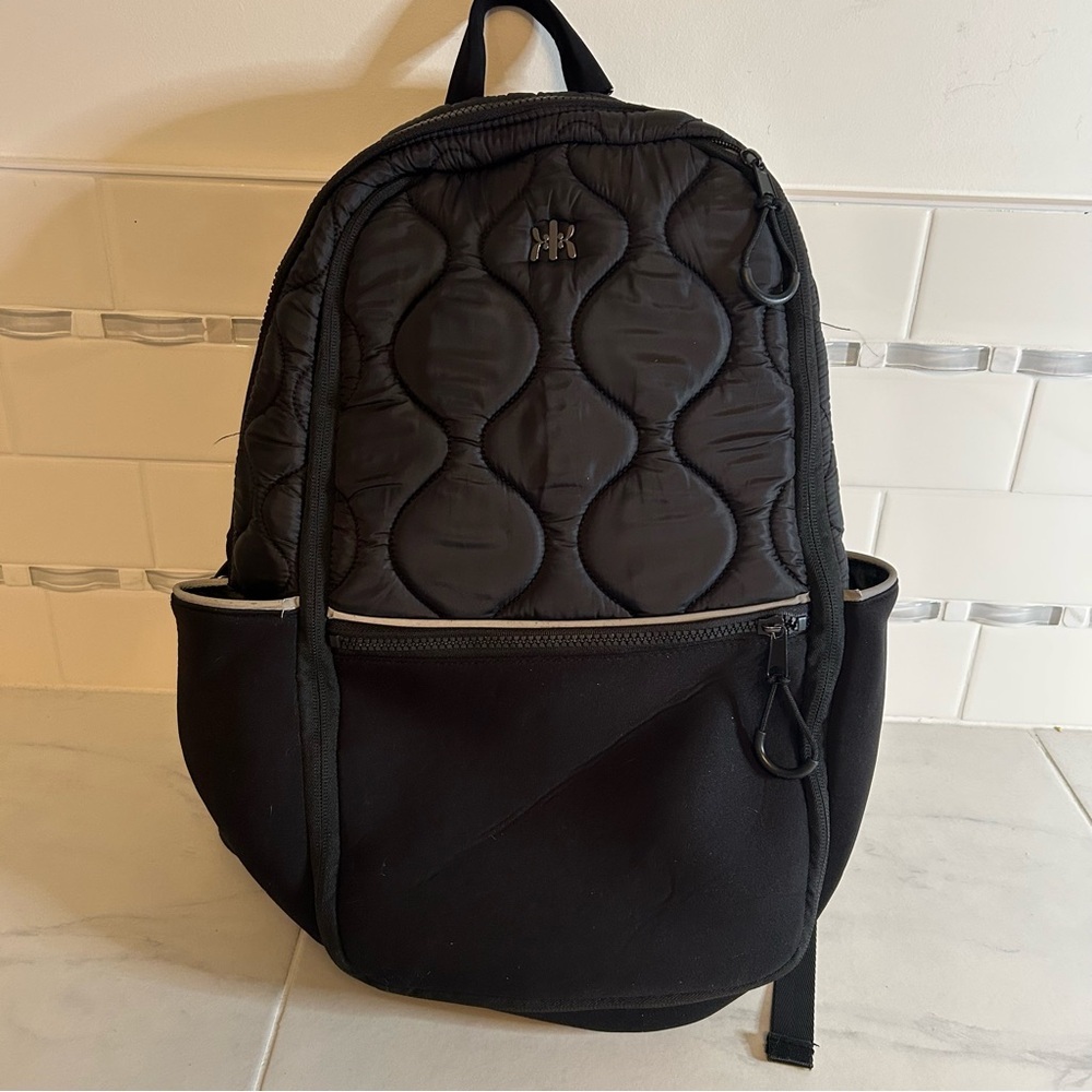 Kyodan Black Quilted Backpack. Expandable.  Zipper pockets.